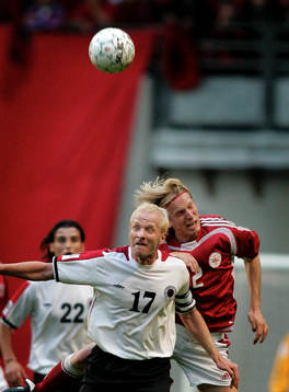 Christian Poulsen, Danmark och Igli Tare, Albanien