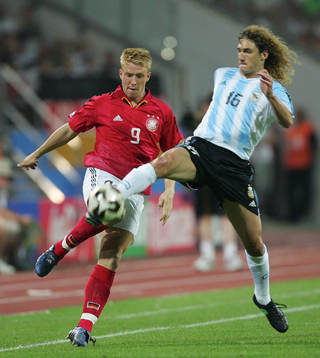 Mike Hanke, Tyskland och  Fabricio Coloccini, Argentina