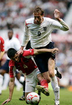 Peter Crouch, England och Paul Scharner, Österrike