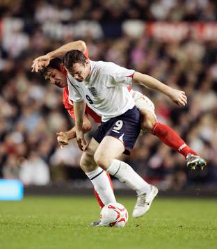 Wayne Rooney och Radoslaw Sobolewski
