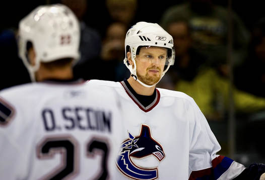 Henrik Sedin och Daniel Sedin i förgrunden