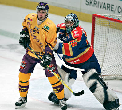 Mathias Johansson, Färjestad och Teemu Lassila, målvakt,