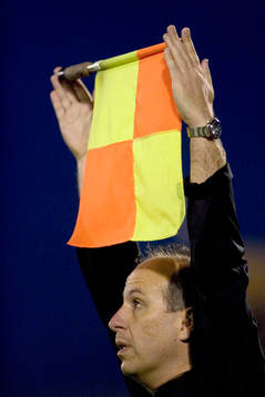 Flagga, linjeflagga, linjedomare, linjeman, genre