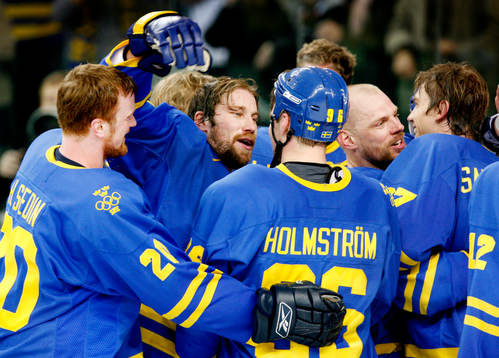 Henrik Sedin, Peter Forsberg och Tomas Holmström, Sverige,