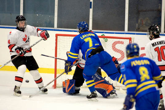 Ty Wishart, Kanada, Tomas Larsson, Sverige