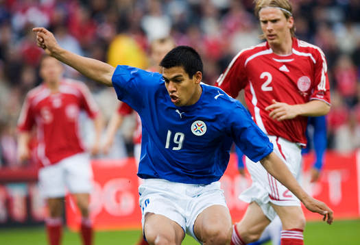 Julio Dos Santos och Christian Poulsen