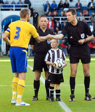 Matchboll, domare, Olof Mellberg
