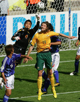 Yoshikatsu Kawaguchi, Japan (Målvakt) och Joshua Kennedy,