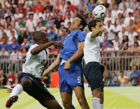 Eddie Pope, Luca Toni, Italien och Steve Cherundolo, USA