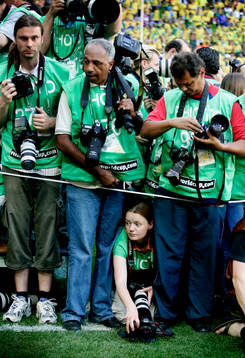 Ont om plats för fotograferna. En fotograf har hittat en