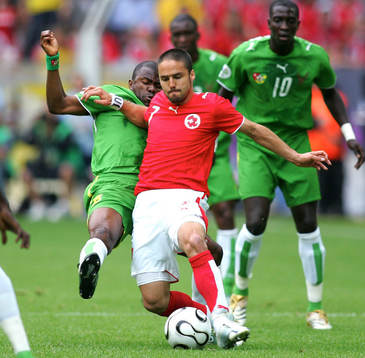 Kuami Agboh, Togo och Ricardo Cabanas, Schweiz