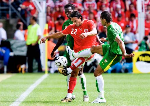 Hakan Yakin, Schweiz, Assimou Toure och Thomas Dossevi, Togo