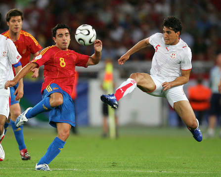 Xavi, Spanien och Zied Jaziri, Tunisien