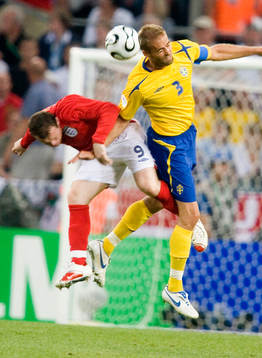 Olof Mellberg, Sverige och Wayne Rooney, England