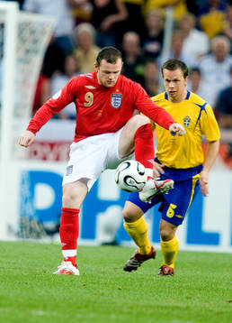Wayne Rooney, England och Tobias Linderoth, Sverige