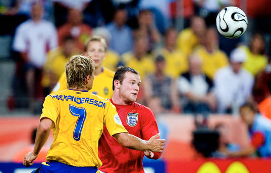 Niclas Alexandersson och Wayne Rooney