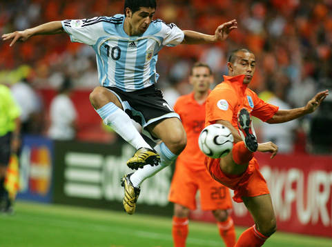 Juan Riquelme och Denny Landzaat