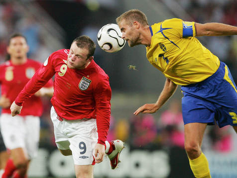 Wayne Rooney, England och Olof Mellberg, Sverige