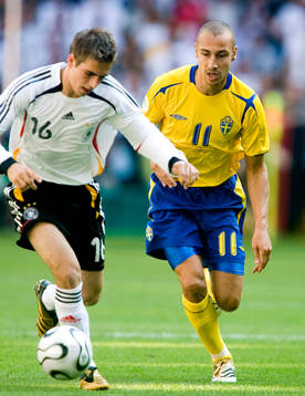 Philipp Lahm, Tyskland och Henrik Larsson, Sverige