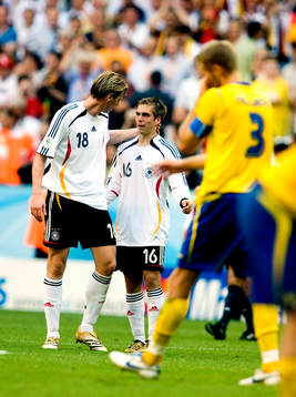 Olof Mellberg, Sverige,  depp och Tim Borowski och Philipp