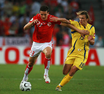 Artem Milevskiy, Ukraina och Philipp Degen, Schweiz