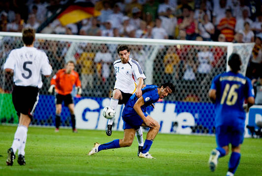 Per Mertesacker, Tyskland och Luca Toni, Italien