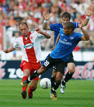 Timo Rost, Rafael van der Vaart, Nigel de Jong