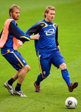 Olof Mellberg och Fredrik Berglund, Sverige