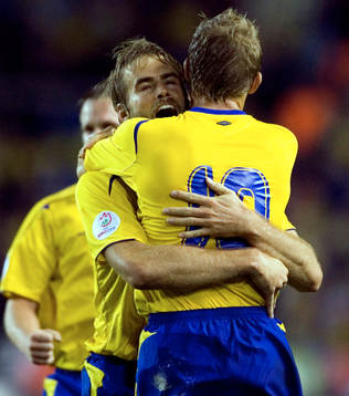 Olof Mellberg, Sverige gratulerar Marcus Allbäck, Sverige
