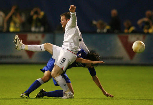 Wayne Rooney, England och Vedran Corluka, Kroatien