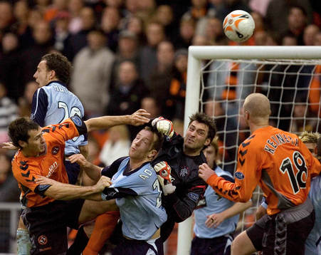 Allan McGregor, målvakt och Dave McCracken, Charlie Adam,