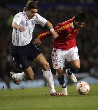 Jonathan Woodgate, England och David Villa, Spanien
