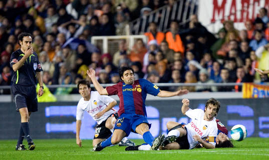 Domare, David Silva och David Albelda, Valencia. Deco och