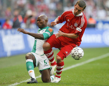 Pierre Wome och Lukas Podolski
