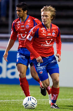 Andreas Landgren och i bakgrunden, Samir Belouta,