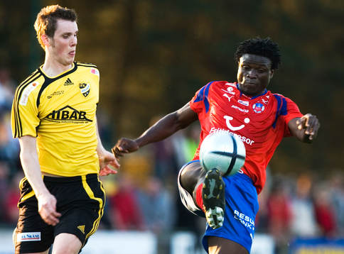 Razak Omotoyossi och Peter Olsson
