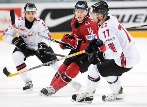 Jonathan Toews, Adrian Wichser och Goran Bezina