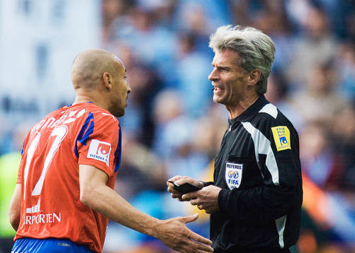 Henrik Larsson  och Peter Fröjdfeldt, domare