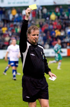 Johnny Lundbäck, gult kort, varning, domare