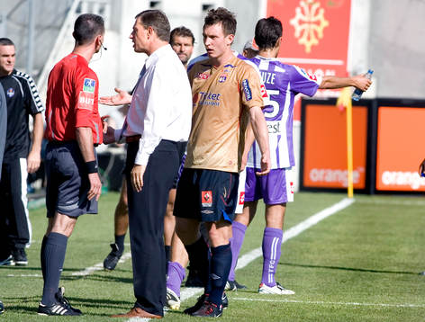 Alain Perrin, tränare och Kim Källström, Lyon.