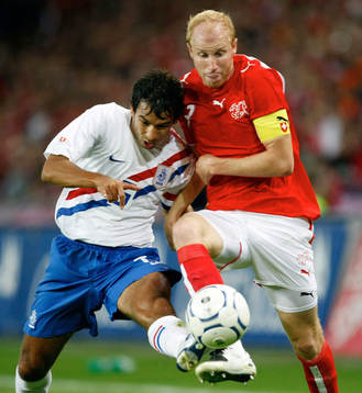 Giovanni van Bronckhorst, Holland och Ludovic Magnin,