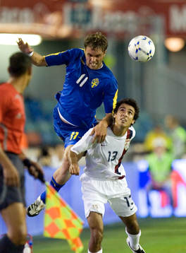 Johan Elmander  och Jonathan Bornstein, USA