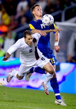 Steve Cherundolo, USA, Markus Rosenberg, Sverige