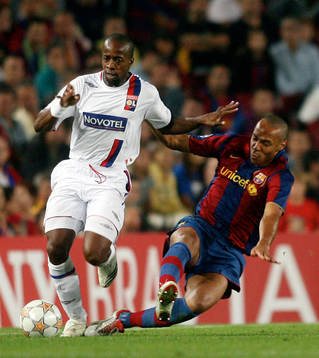 Sidney Govou, Lyon och Thierry Henry, Barcelona