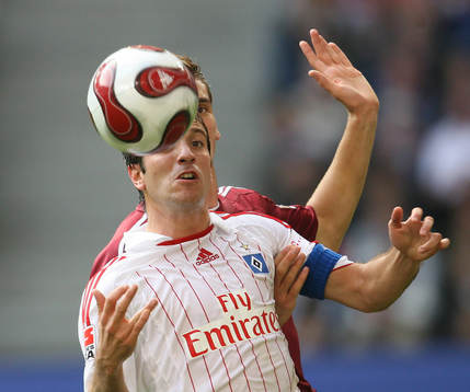 Rafael van der Vaart och Matthew Spiranovic