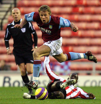 Dwight Yorke och Martin Laursen