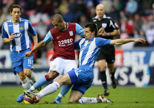 Luke Moore, Aston Villa och Paul Scharner, Wigan