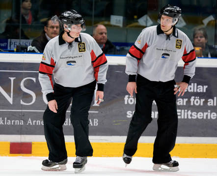 Ulf Rådbjer och Mikael Lindqvist, Huvuddomare. Domare
