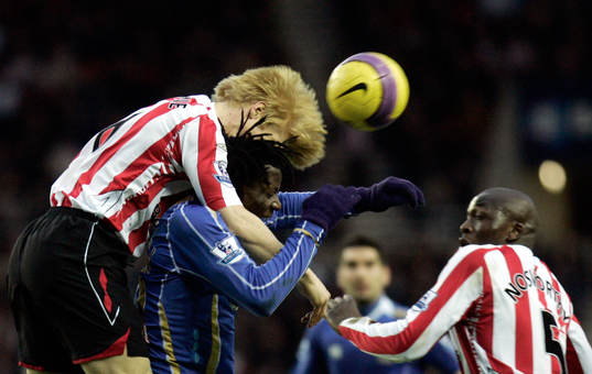 Paul McShane och Benjamin Mwaruwari