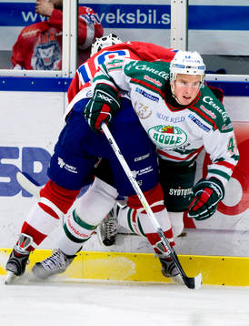 Martin Johansson, Rögle tacklas in i sargen av Per